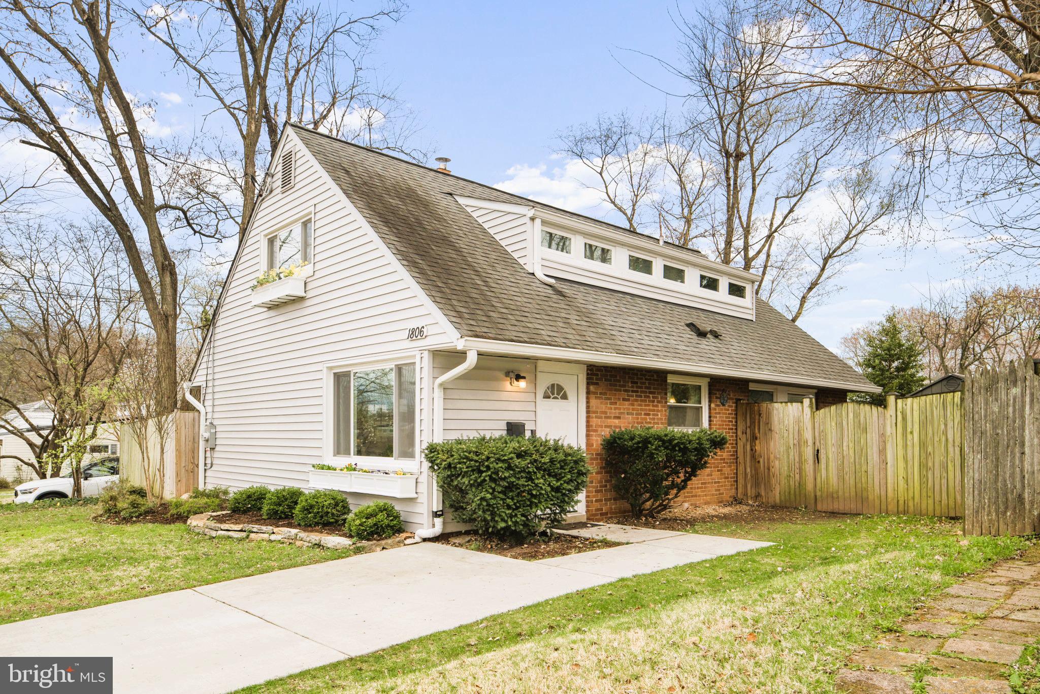 1806 Tilton Drive Silver Spring, MD 20902 - Photo 3 of 54 a view of a house with backyard and a tree