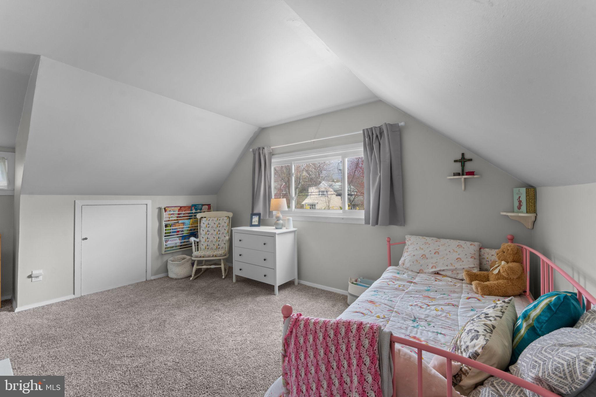 1806 Tilton Drive Silver Spring, MD 20902 - Photo 36 of 54 a bedroom with bed and a window