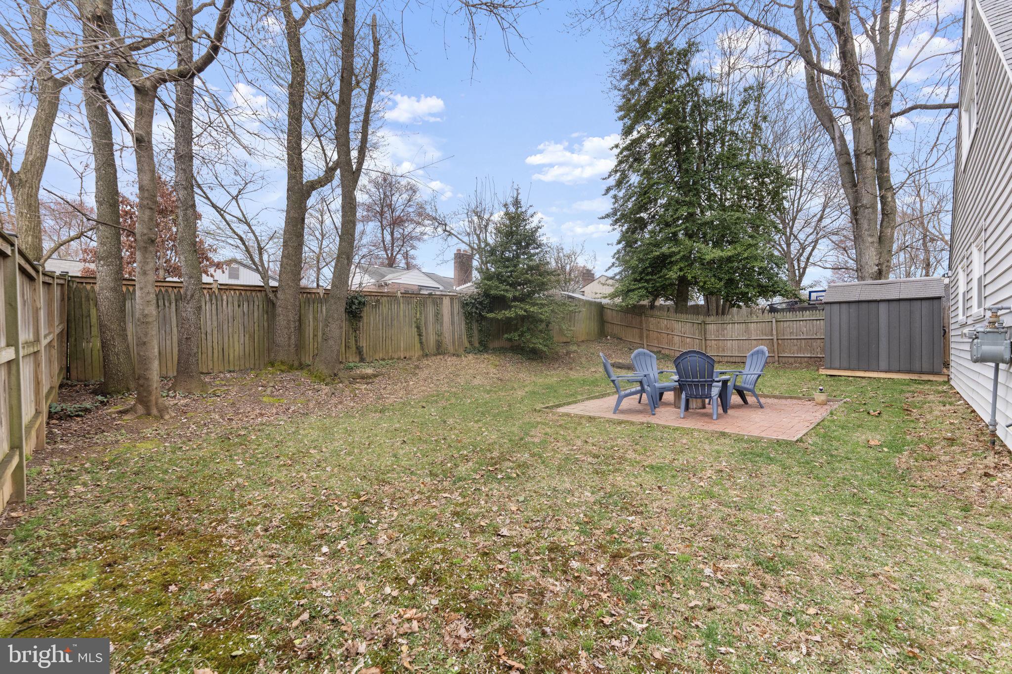 1806 Tilton Drive Silver Spring, MD 20902 - Photo 43 of 54 a backyard of a house with table and chairs