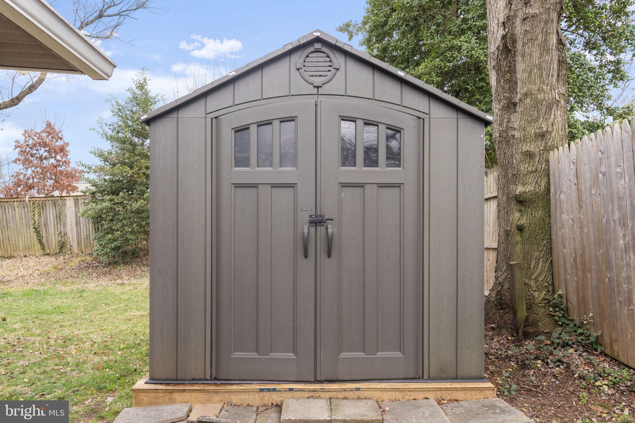 1806 Tilton Drive Silver Spring, MD 20902 - Photo 45 of 54 a view of a wooden house with a small yard