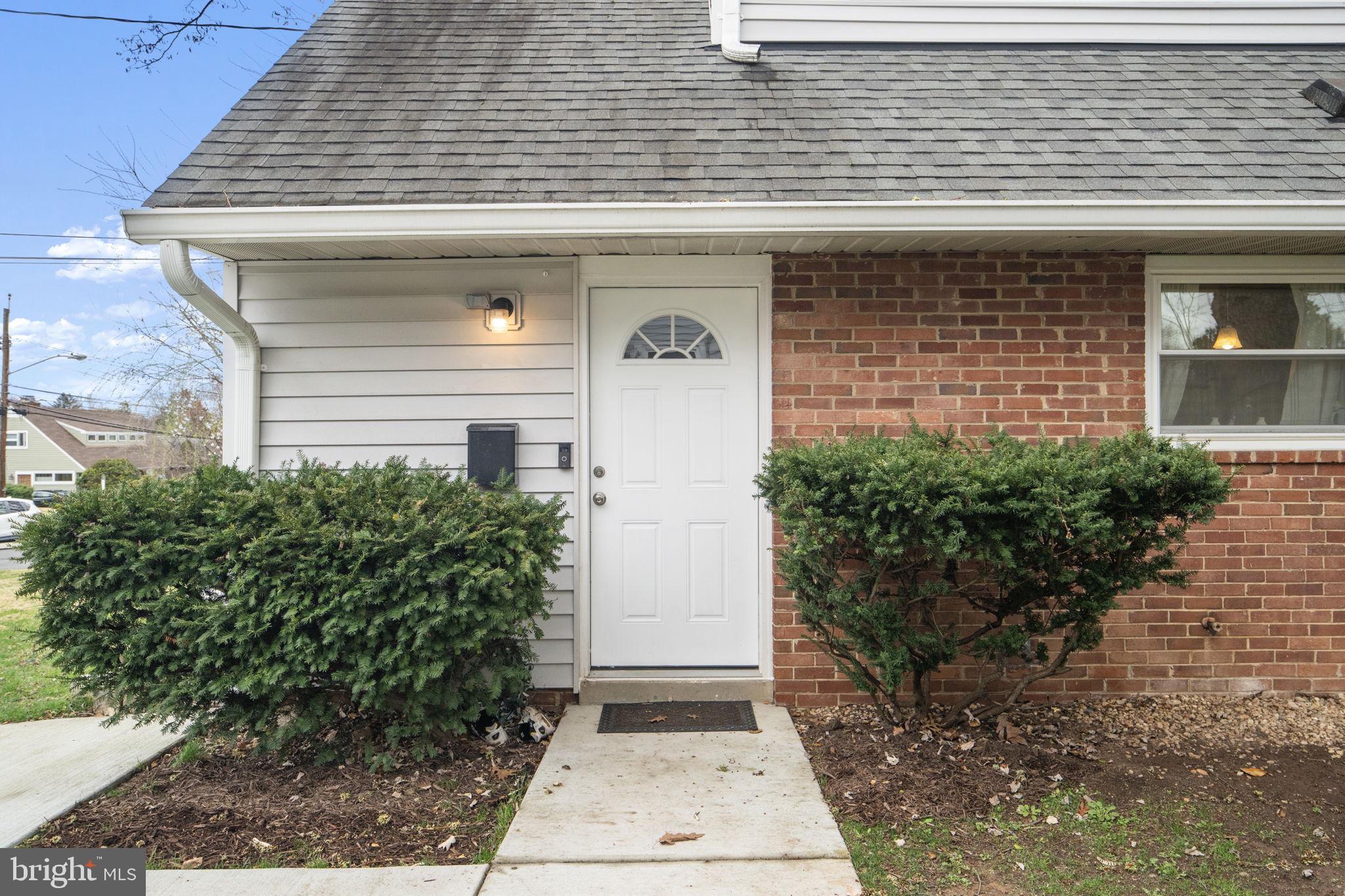 1806 Tilton Drive Silver Spring, MD 20902 - Photo 6 of 54 a front view of a house with garden