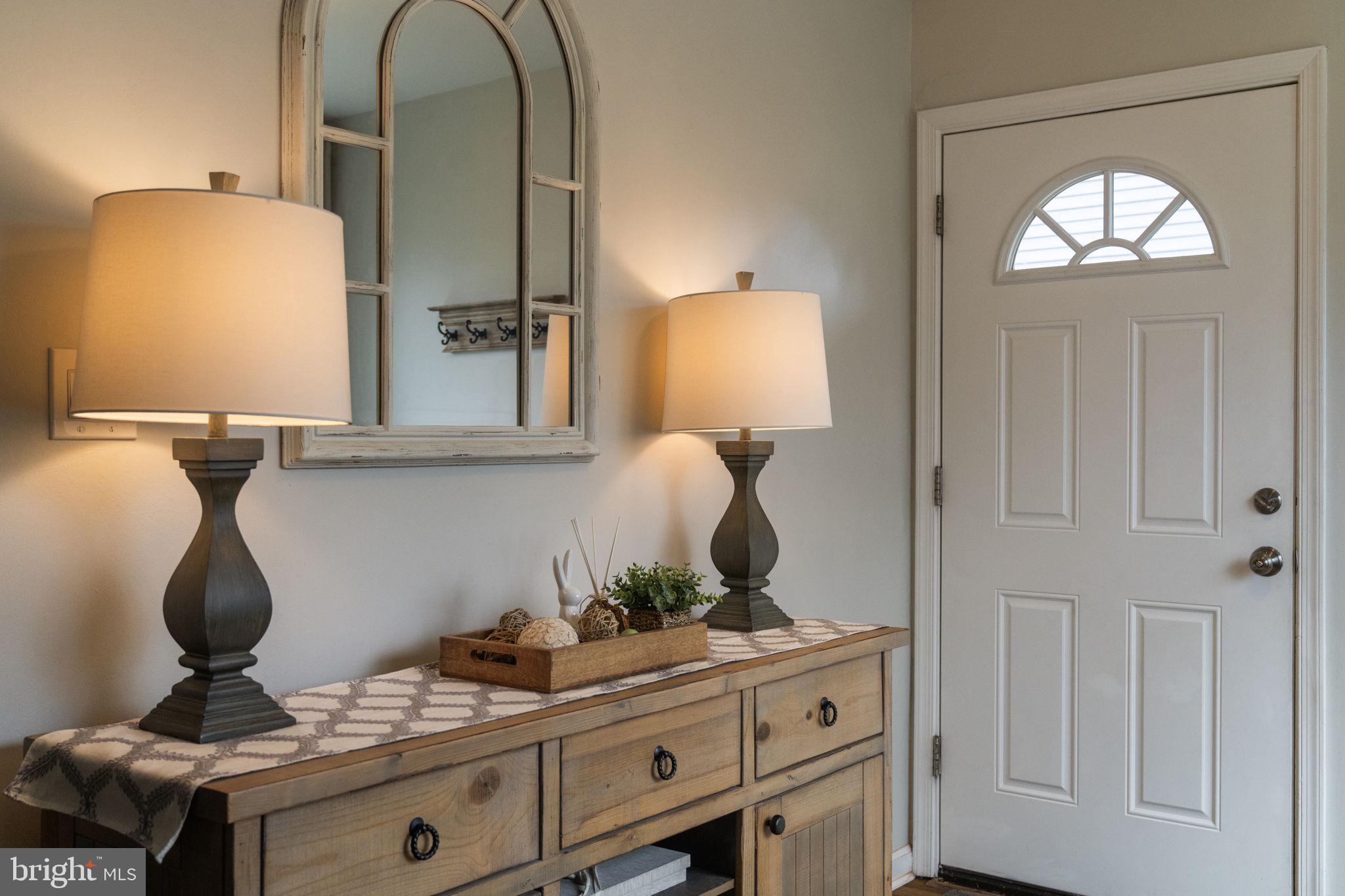 1806 Tilton Drive Silver Spring, MD 20902 - Photo 8 of 54 a bathroom with a sink and a mirror