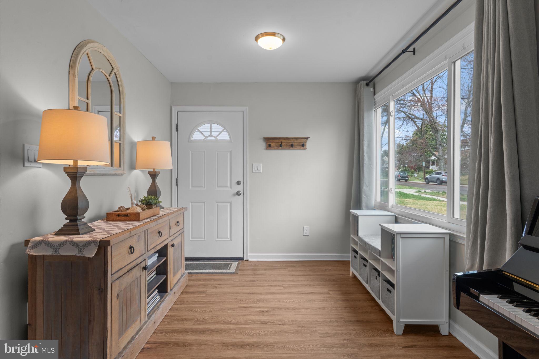 1806 Tilton Drive Silver Spring, MD 20902 - Photo 10 of 54 a room with a window and a dresser