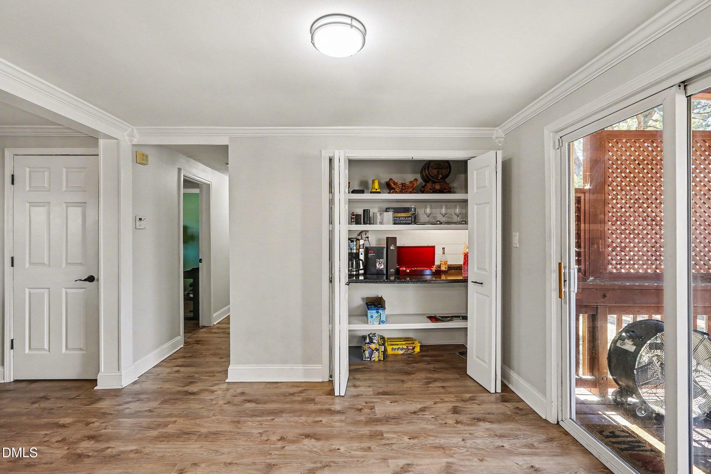 774 Abbott Road Henderson, NC 27537 - Photo 15 of 31 a view of storage and utility room in a hall