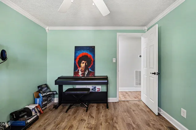 a bathroom with a sink toilet and a mirror