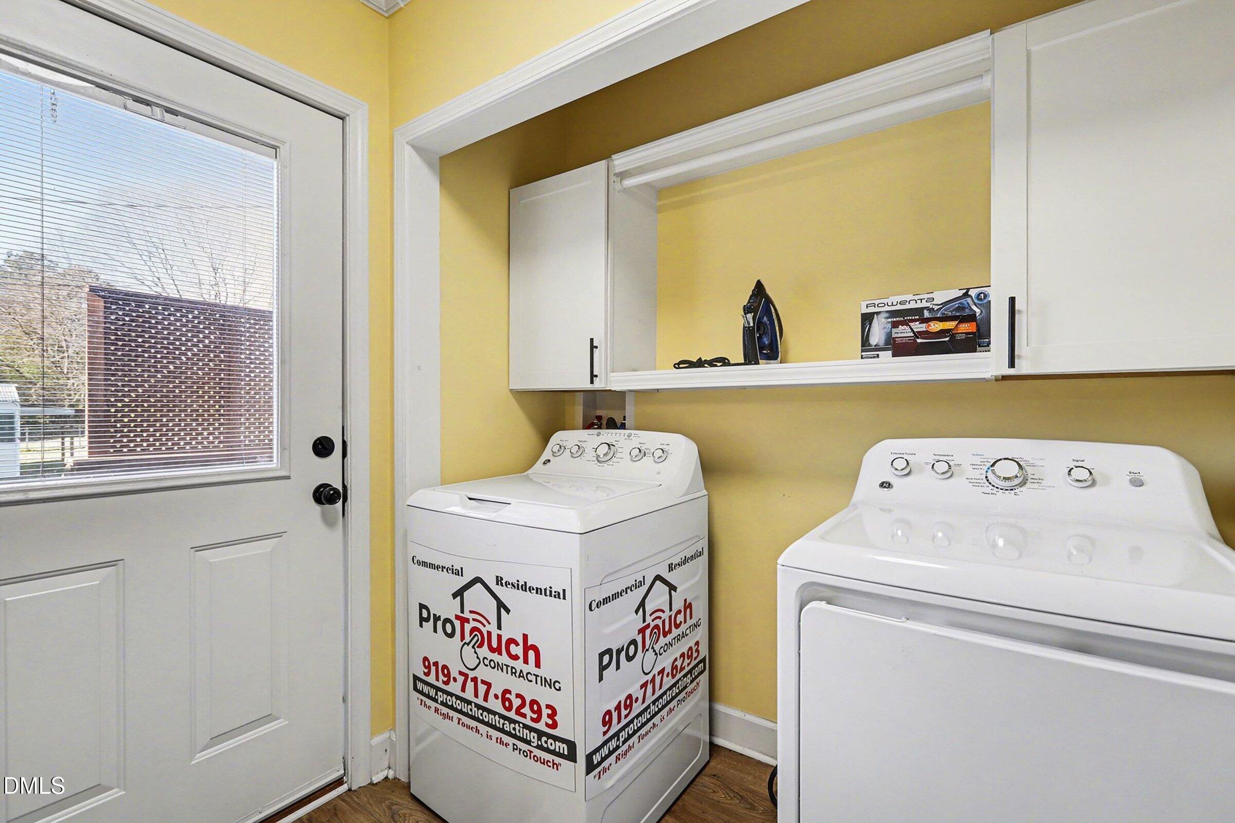 774 Abbott Road Henderson, NC 27537 - Photo 23 of 31 a utility room with dryer and washer