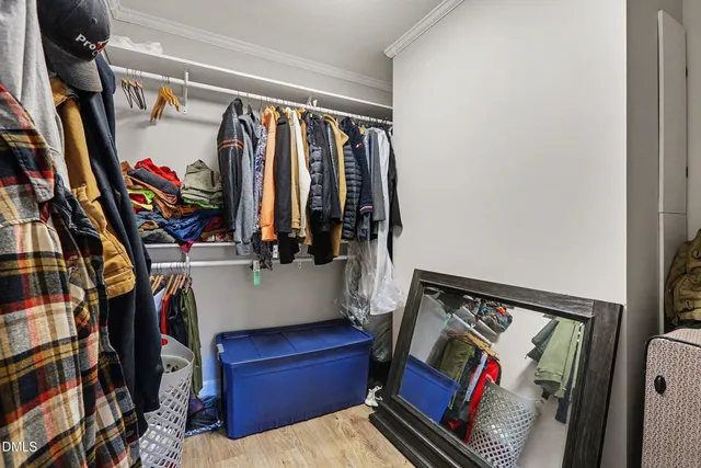 a view of a chairs and table in the balcony