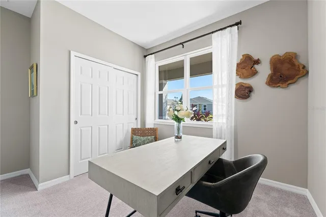 a view of kitchen island with furniture and wooden floor