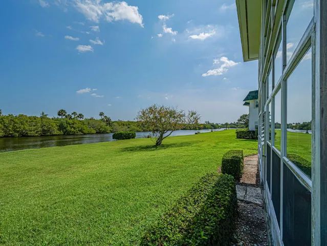 a view of a golf course with a lake