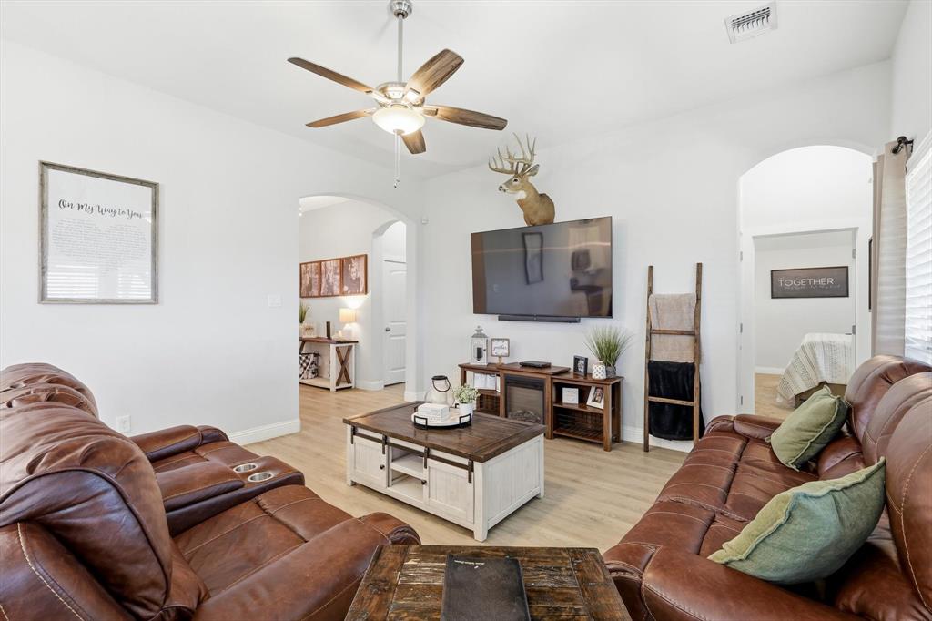 4101 Windmill Court Sanger, TX 76266 - Photo 11 of 36 a living room with furniture