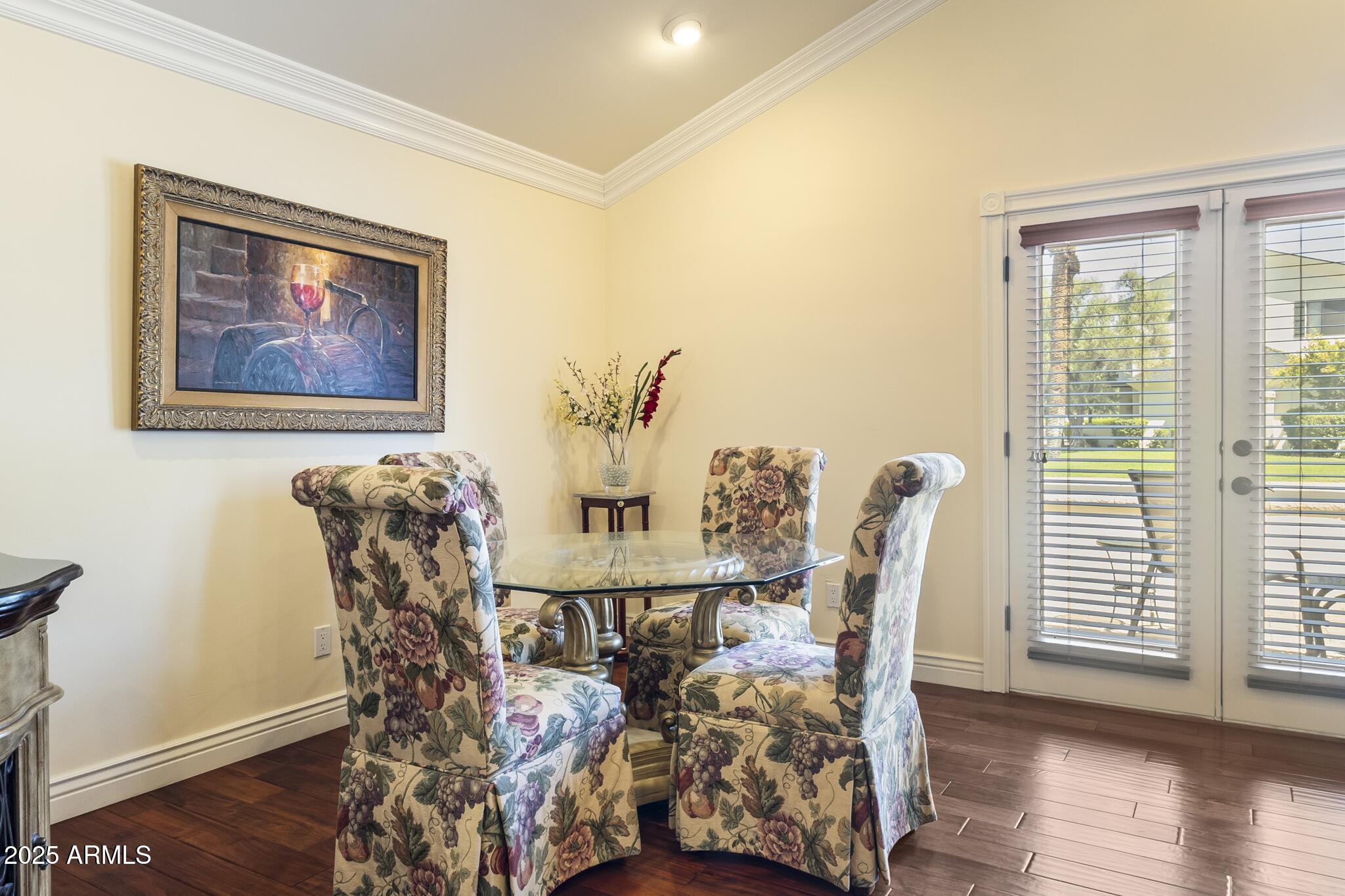 229 West Vista Avenue Phoenix, AZ 85021 - Photo 19 of 115 a view of a dining room with furniture and wooden floor