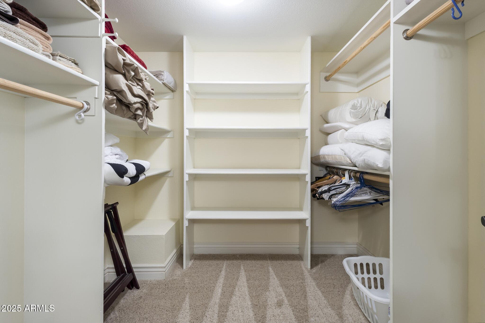 229 West Vista Avenue Phoenix, AZ 85021 - Photo 50 of 115 a view of walk in closet with clothes and shoes