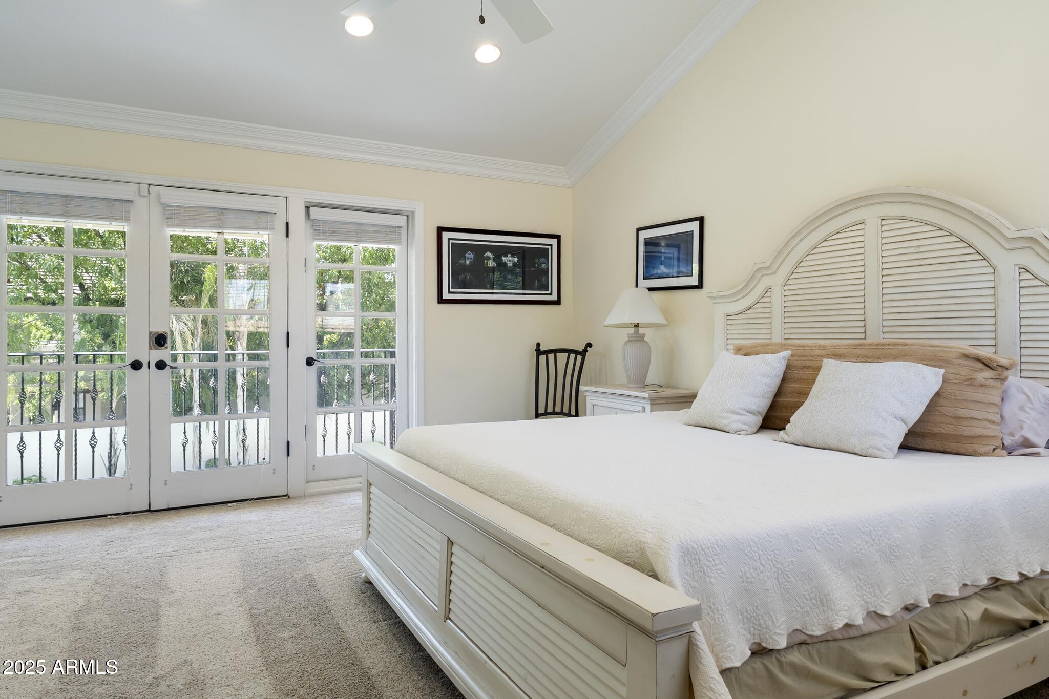 229 West Vista Avenue Phoenix, AZ 85021 - Photo 56 of 115 a bedroom with a balcony a bed and a large window