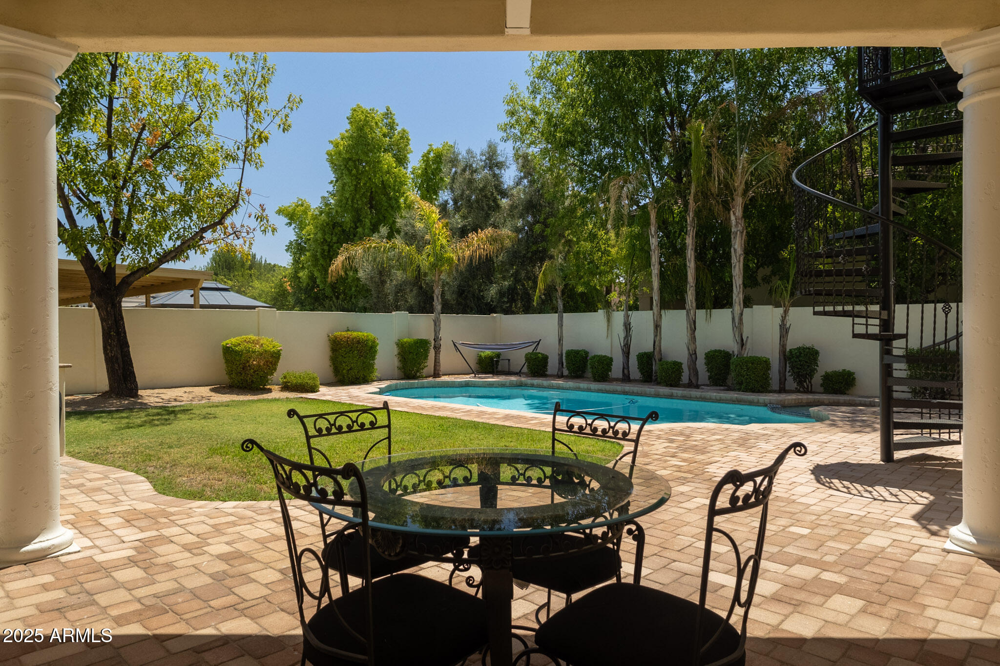 229 West Vista Avenue Phoenix, AZ 85021 - Photo 90 of 115 a view of a swimming pool with a patio