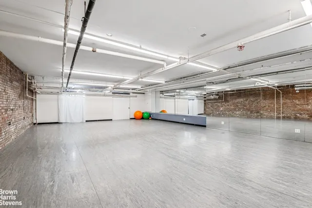 a utility room with sink dryer and washer