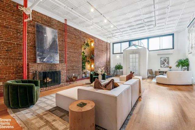 a view of a kitchen with a sink and a stove
