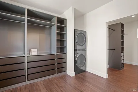 a view of an empty room with windows