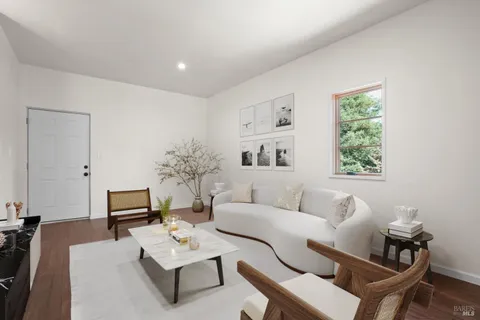 a white bath tub sitting next to a white sink