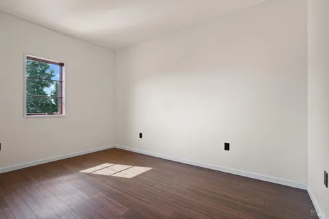 an aerial view of a residential houses with outdoor space