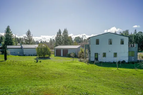 a house view with a garden space