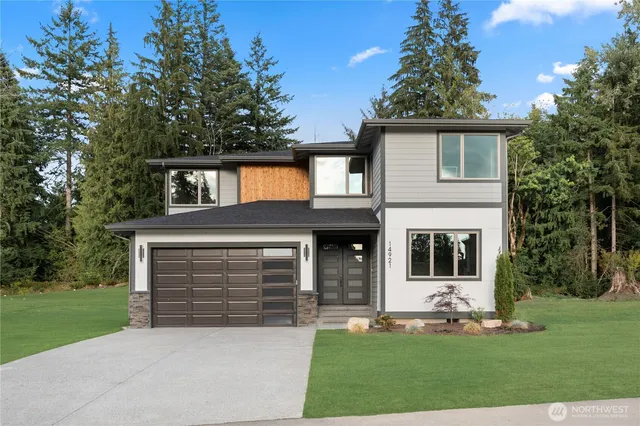 front view of a house with a yard