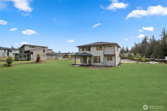 a view of a house with a big yard