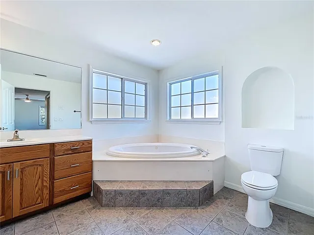 a bathroom with a bathtub sink and toilet