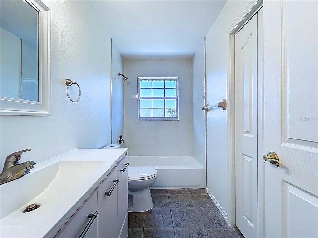 4103 North Rye Road Parrish, FL 34219 - Photo 32 of 40 a bathroom with a sink toilet and shower