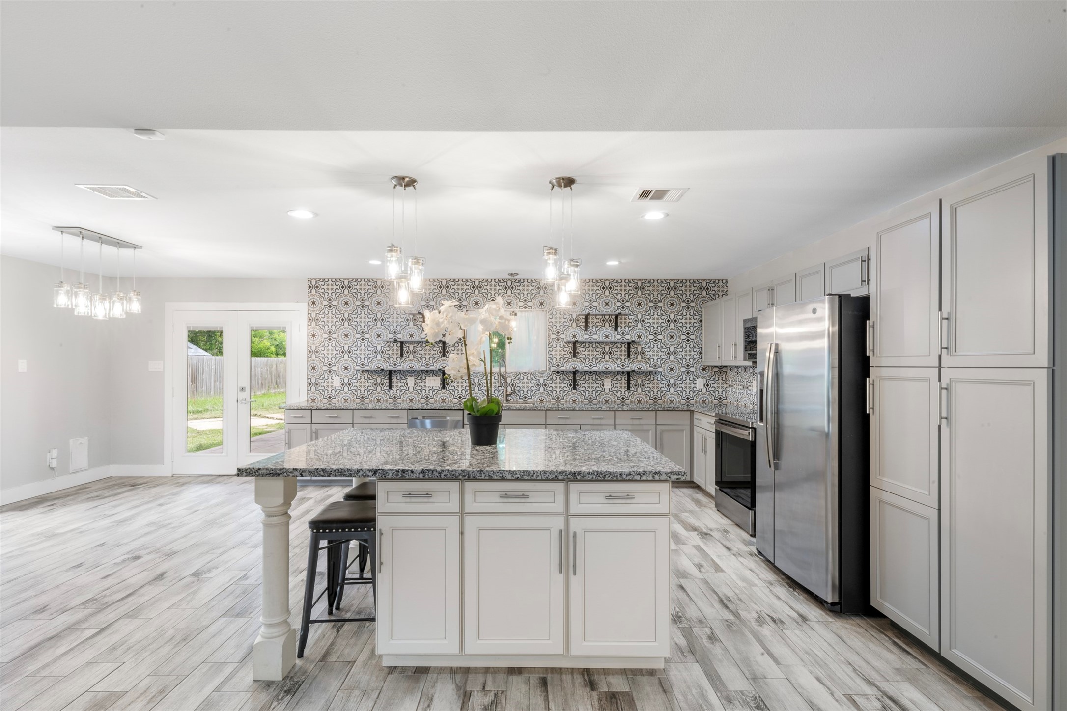 15151 Robin Trail Conroe, TX 77302 - Photo 16 of 50 large island with built in cabinets & seating