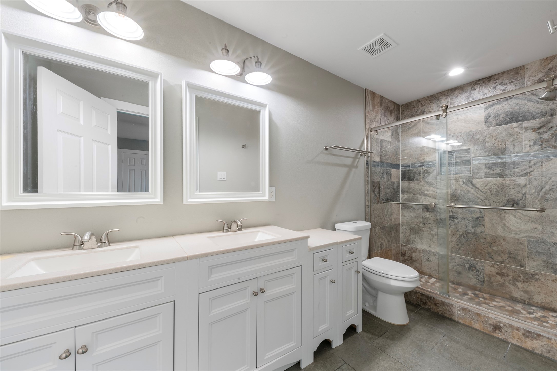 15151 Robin Trail Conroe, TX 77302 - Photo 27 of 50 Primary bathroom with large walk-in shower and dual sinks
