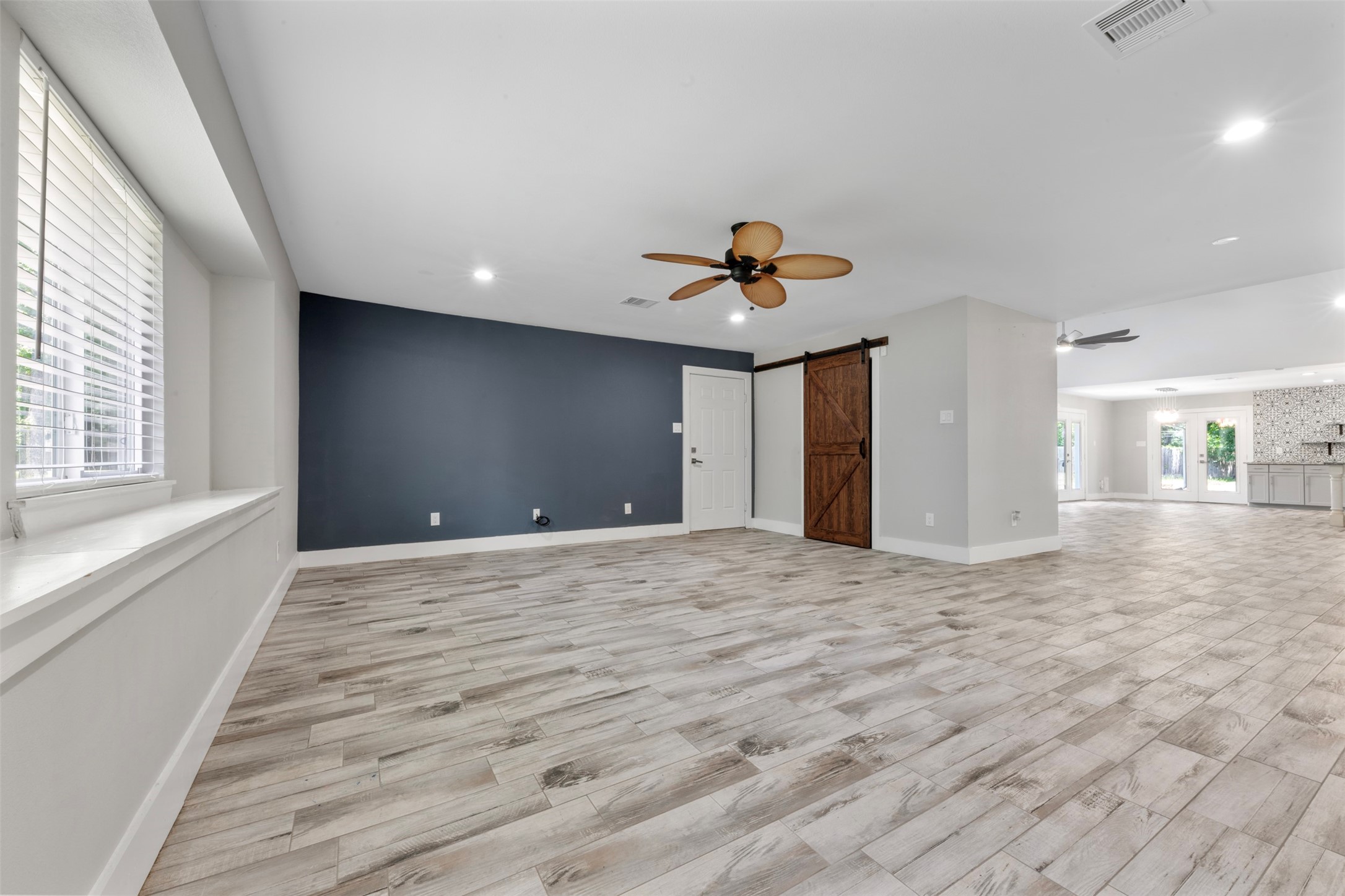 15151 Robin Trail Conroe, TX 77302 - Photo 5 of 50 Another angle of the bonus room with access to the driveway and indoor utility room