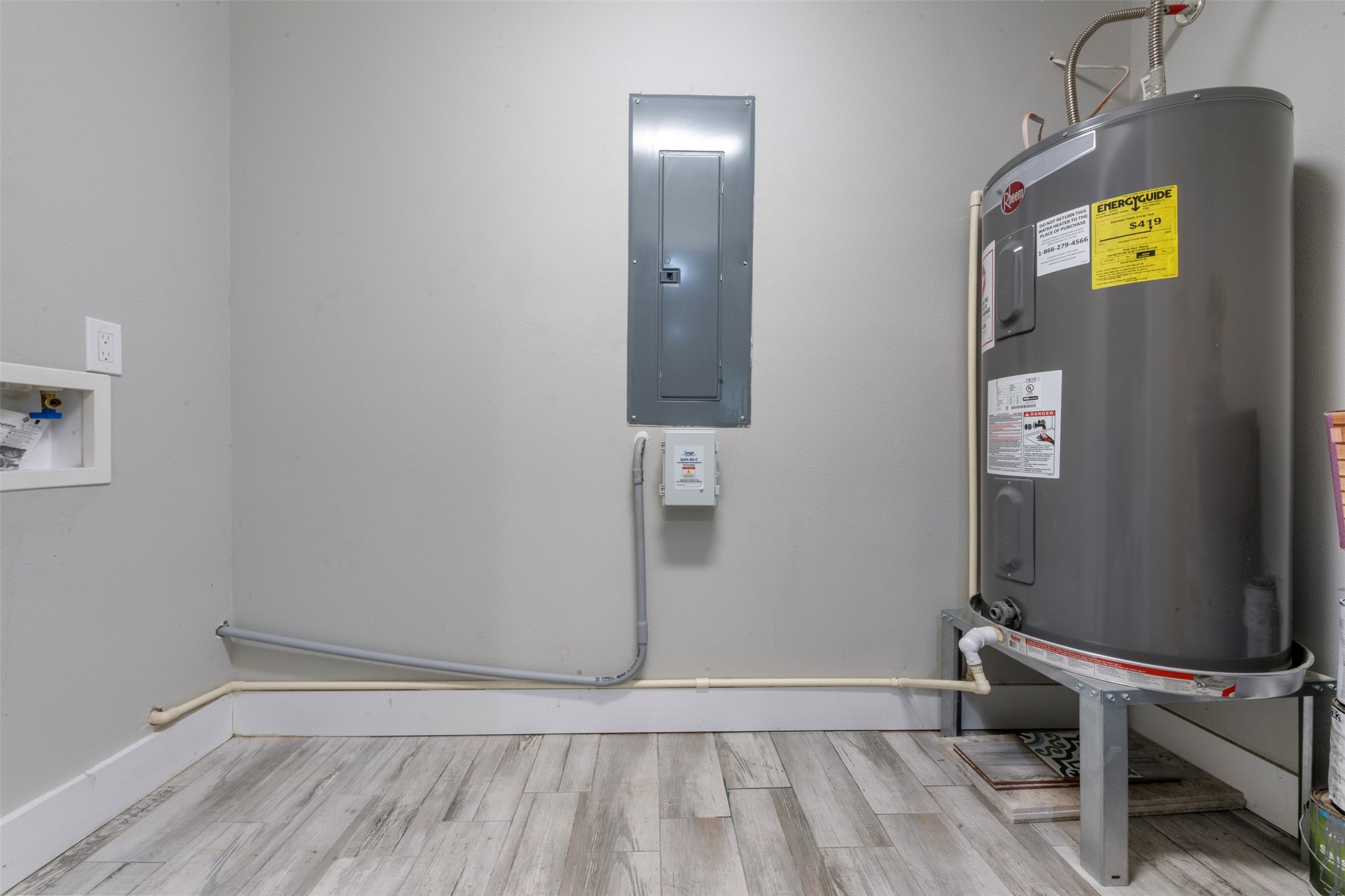 15151 Robin Trail Conroe, TX 77302 - Photo 7 of 50 Indoor Utility Room with new hot water heater