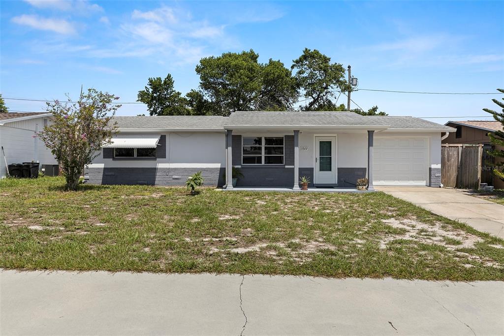3522 Bedford Street New Port Richey, FL 34652 - Photo 1 of 1 Welcome Home! 2 bed/2 Bath block home with one car attached garage, storm door...and notice the extra parking in the front of the home!