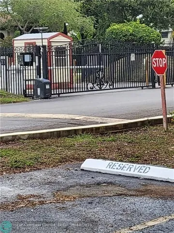 a view of a wooden fence
