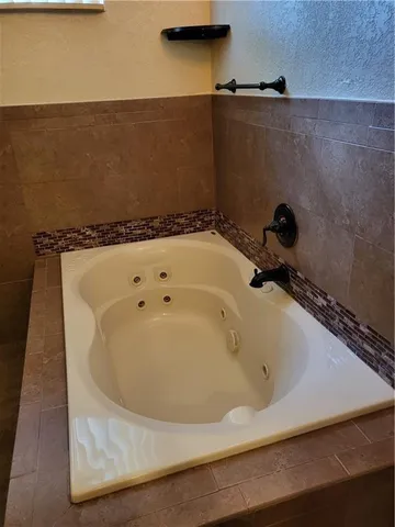 a bathroom with a bathtub