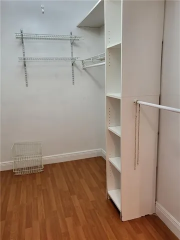 a view of an empty walk in closet