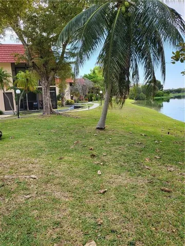 a view of a lake from a yard