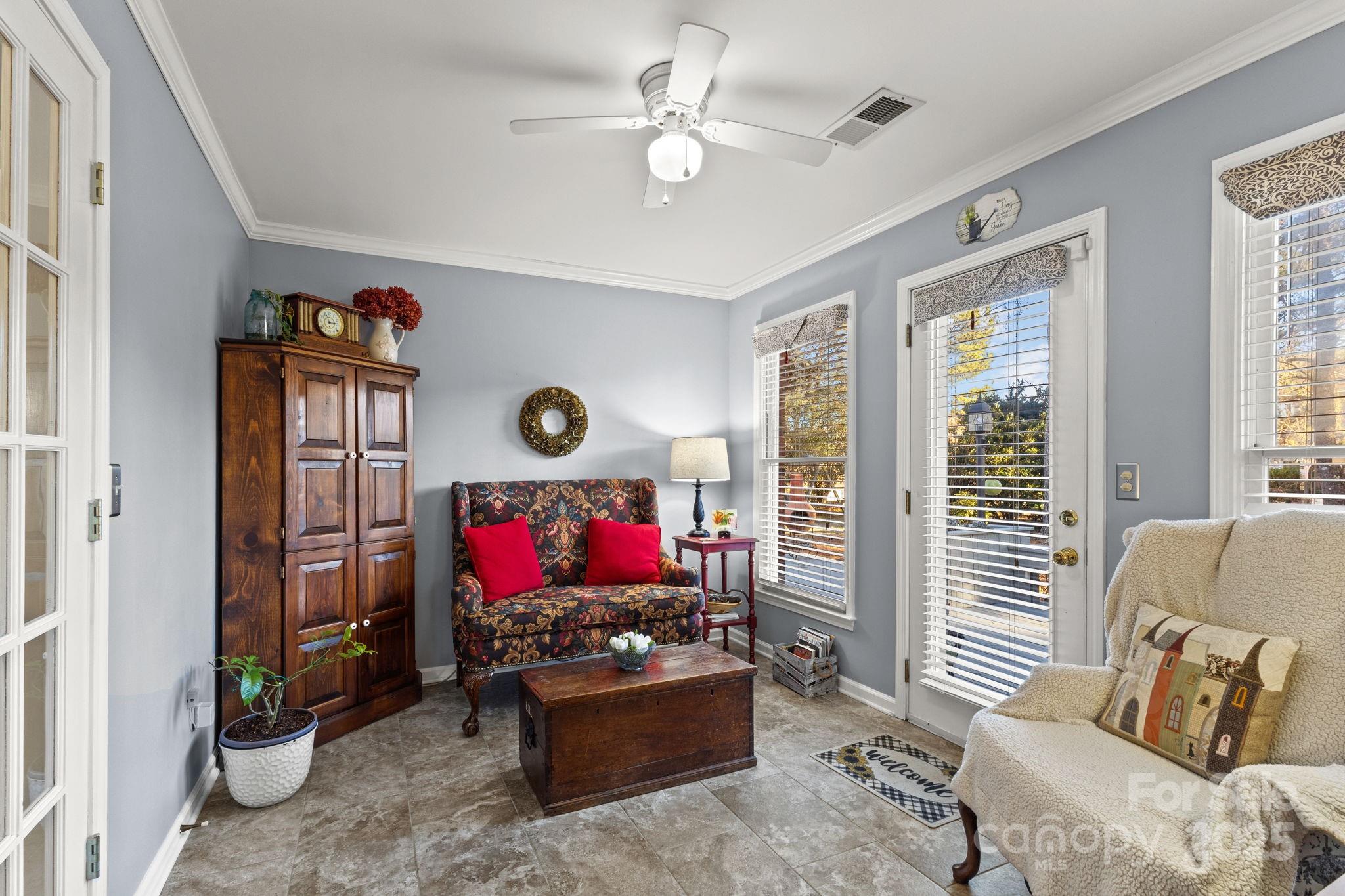 227 Point Wylie Lane Fort Mill, SC 29708 - Photo 14 of 36 a living room with furniture and a flat screen tv