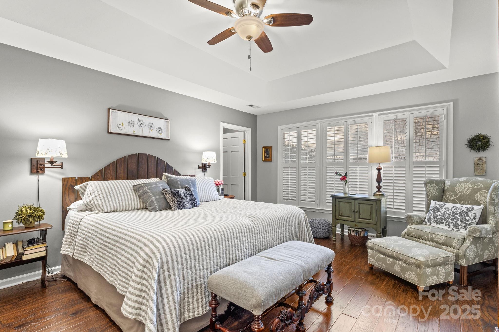 227 Point Wylie Lane Fort Mill, SC 29708 - Photo 16 of 36 a bedroom with a bed and a couch