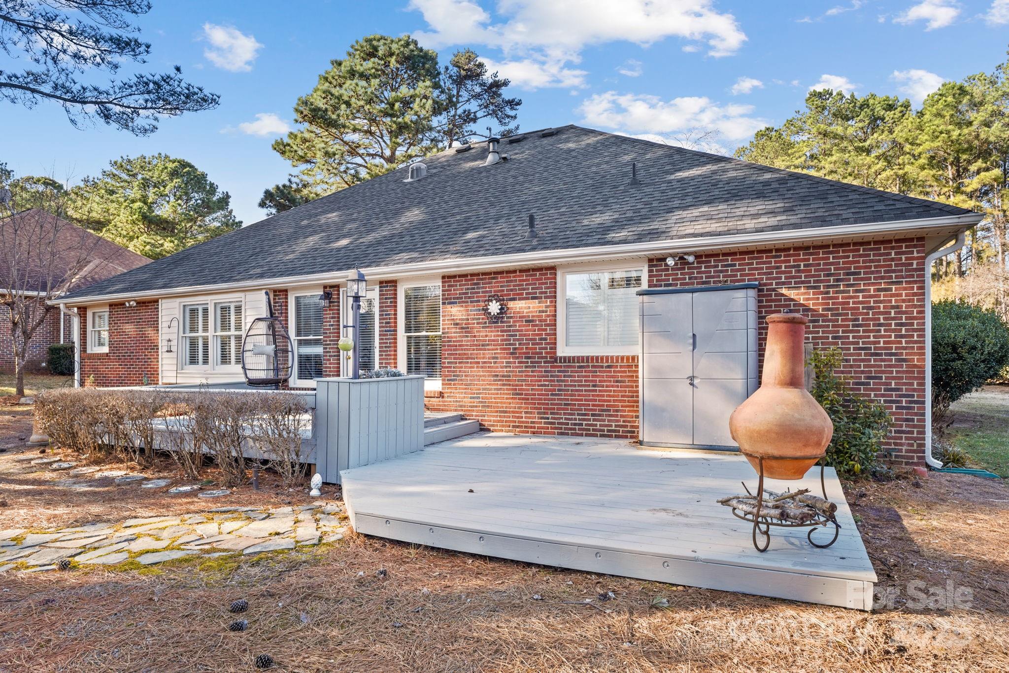 227 Point Wylie Lane Fort Mill, SC 29708 - Photo 31 of 36 a front view of a house with garden