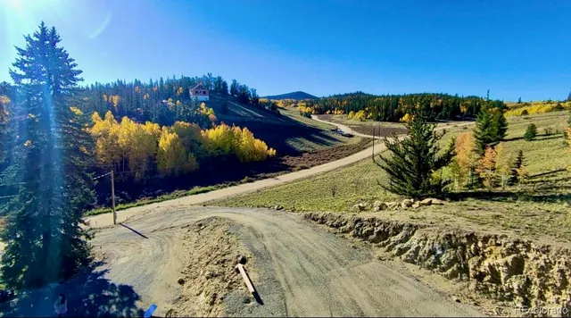 a view of swimming pool with a yard