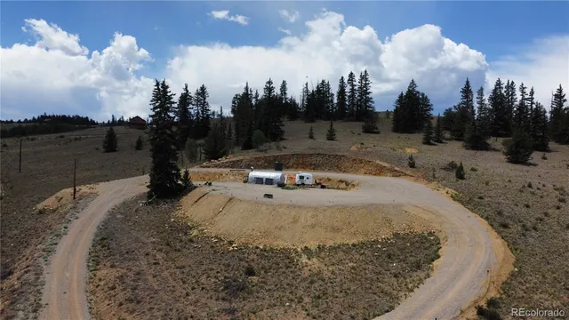 a view of a backyard of the house