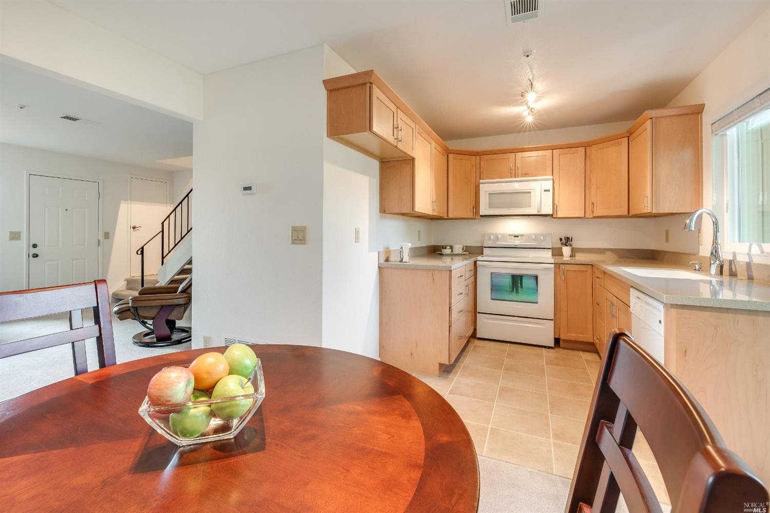 1455 Gold Way Rohnert Park, CA 94928 - Photo 1 of 1 a kitchen with a sink appliances cabinets and a counter top space