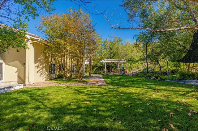 an aerial view of multiple house with yard