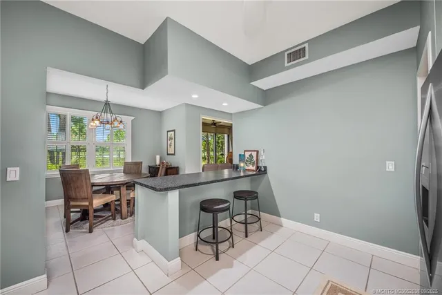 a view of a workspace and kitchen