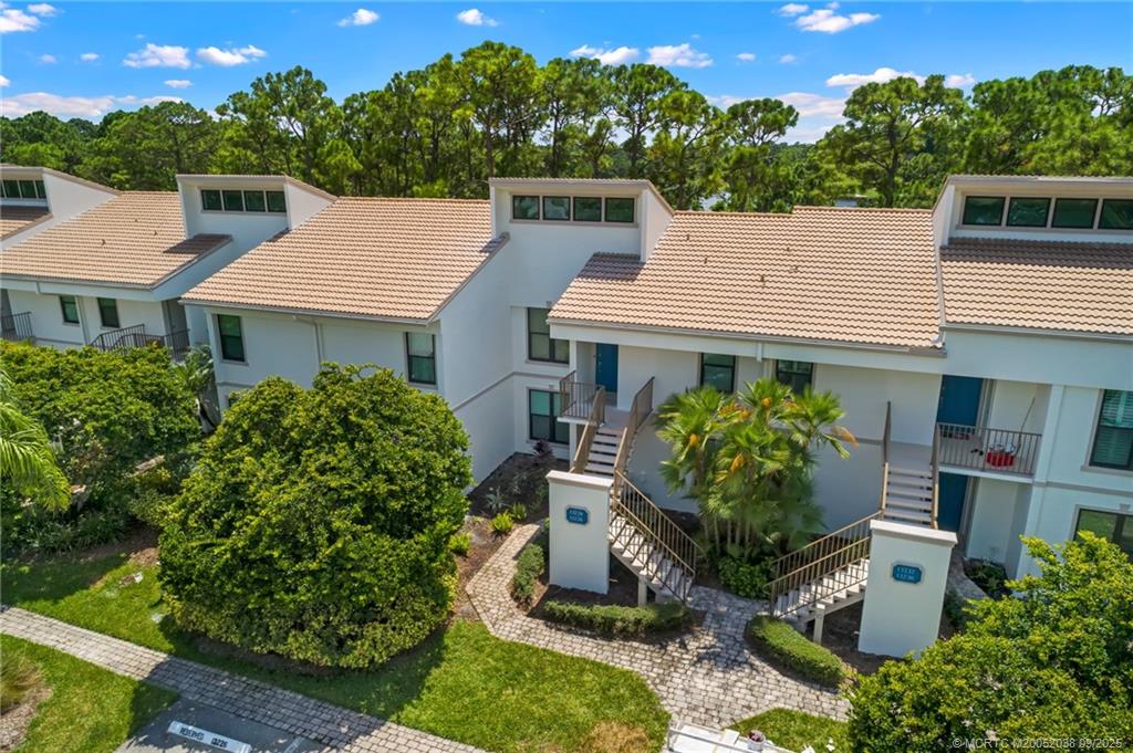13226 Harbour Ridge Boulevard, Unit 5B Palm City, FL 34990 - Photo 22 of 28 an aerial view of a house