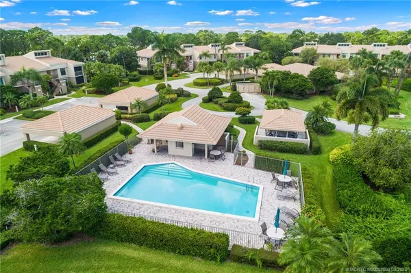an aerial view of a house with a garden