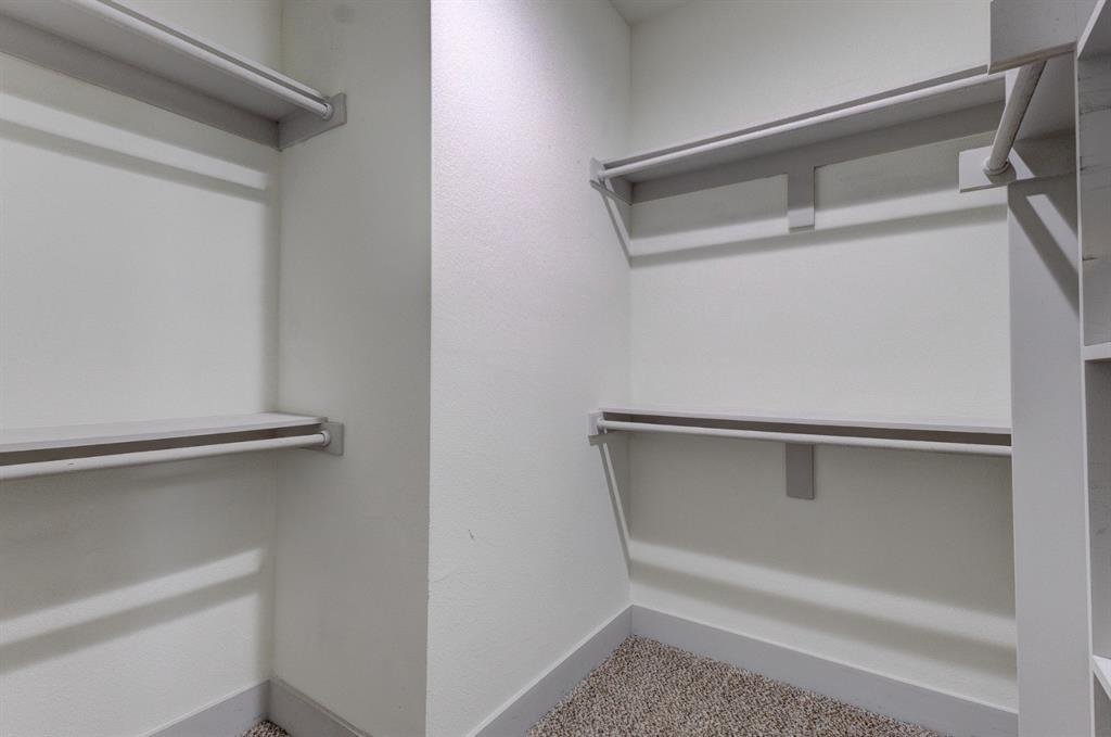 6043 Rivendell Drive Frisco, TX 75035 - Photo 20 of 38 a view of an empty walk in closet