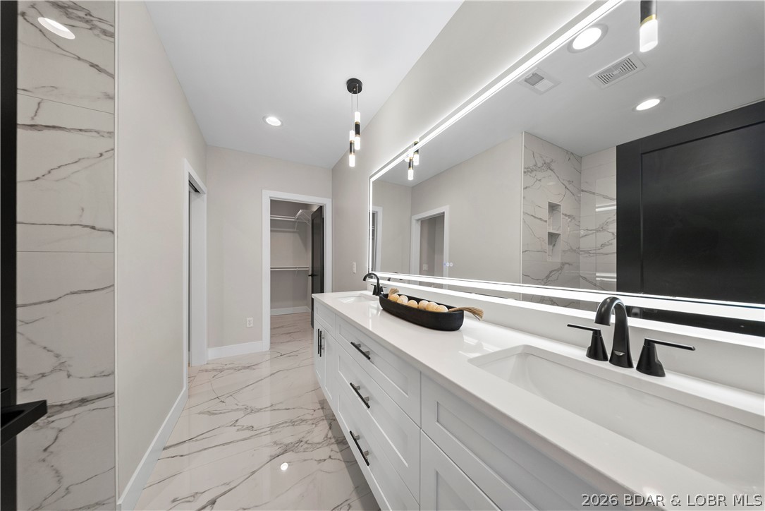 439 Red Bud Road Lake Ozark, MO 65049 - Photo 55 of 98 Stylish full bathroom with dual vanity, premium ca
