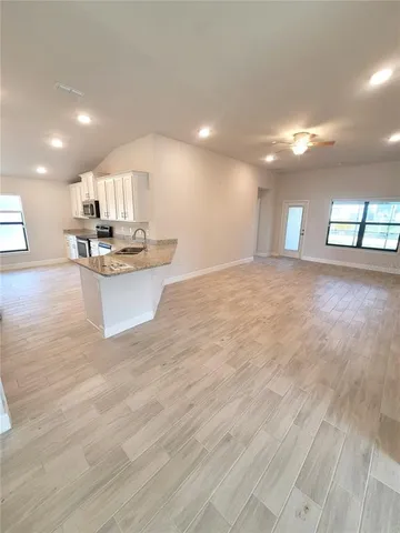 a view of kitchen and kitchen island